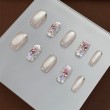 Petal and Rhinestone Nail Art