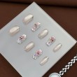 Petal and Rhinestone Nail Art