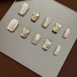Champagne Colored Elegant Nail Art with Rhinestones