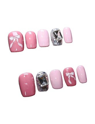 Adorable Bow and Rhinestone Nail Art