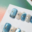 Blue Cat-Eye Starry Night Nail Art